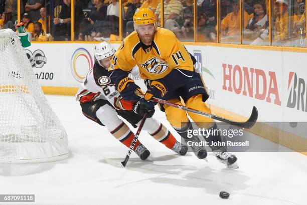 Mattias Ekholm of the Nashville Predators skates against Rickard Rakell of the Anaheim Ducks in Game Three of the Western Conference Final during the...