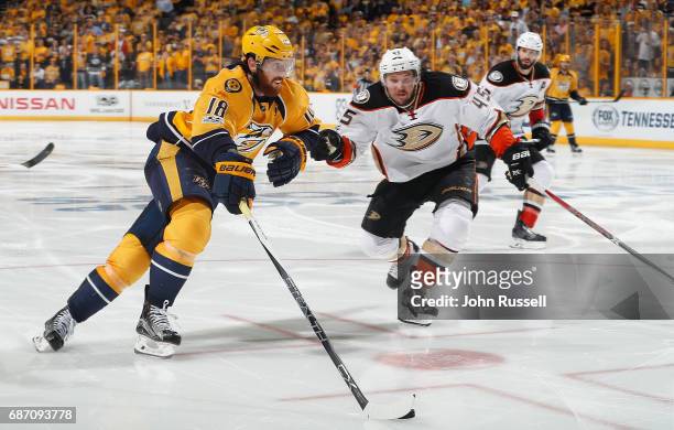 James Neal of the Nashville Predators skates against Sami Vatanen of the Anaheim Ducks in Game Four of the Western Conference Final during the 2017...