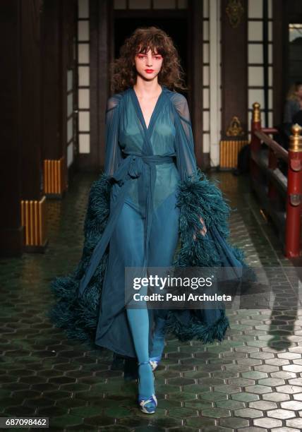 Model walks the runway in Wolk Morais Collection 5 Fashion Show at Yamashiro Hollywood on May 22, 2017 in Los Angeles, California.