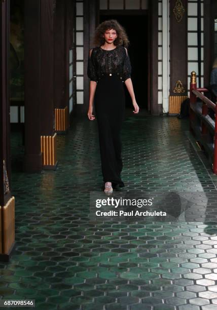 Model walks the runway in Wolk Morais Collection 5 Fashion Show at Yamashiro Hollywood on May 22, 2017 in Los Angeles, California.