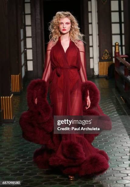 Model walks the runway in Wolk Morais Collection 5 Fashion Show at Yamashiro Hollywood on May 22, 2017 in Los Angeles, California.