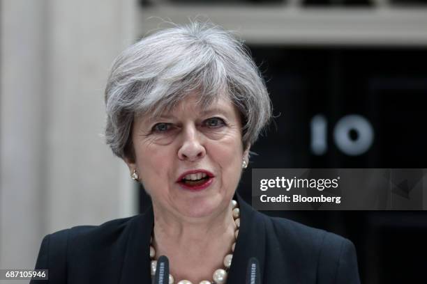 Theresa May, U.K. Prime minister, delivers a statement outside number 10 Downing Street in London, U.K., on Tuesday, May 23, 2017. At least 22 people...