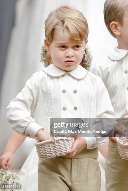 Prince George of Cambridge attends the wedding of Pippa Middleton and James Matthews at St Mark's Church on May 20, 2017 in Englefield Green, England.