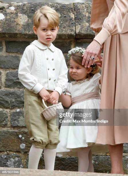 Prince George of Cambridge and Princess Charlotte of Cambridge attend the wedding of Pippa Middleton and James Matthews at St Mark's Church on May...