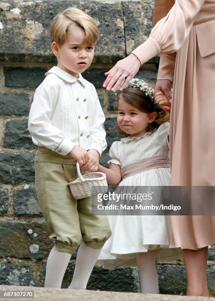 Prince George of Cambridge and Princess Charlotte of Cambridge attend the wedding of Pippa Middleton and James Matthews at St Mark's Church on May...