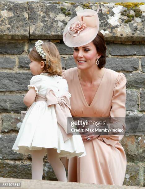 Catherine, Duchess of Cambridge and Princess Charlotte of Cambridge attend the wedding of Pippa Middleton and James Matthews at St Mark's Church on...