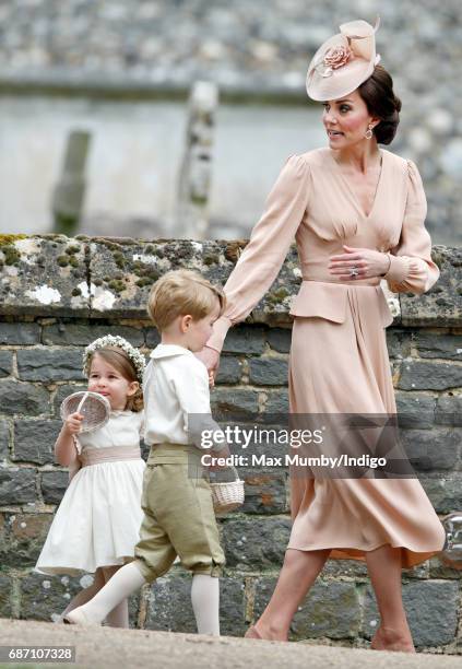 Catherine, Duchess of Cambridge, Prince George of Cambridge and Princess Charlotte of Cambridge attend the wedding of Pippa Middleton and James...