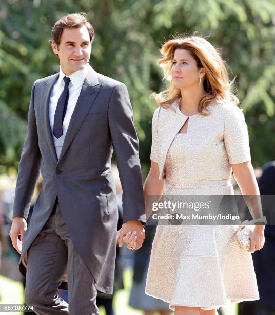 Roger Federer and Mirka Federer attend the wedding of Pippa Middleton and James Matthews at St Mark's Church on May 20, 2017 in Englefield Green,...