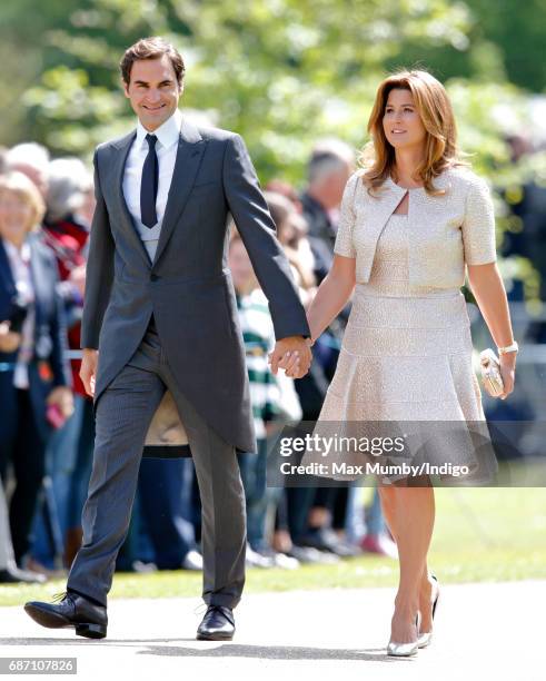 Roger Federer and Mirka Federer attend the wedding of Pippa Middleton and James Matthews at St Mark's Church on May 20, 2017 in Englefield Green,...