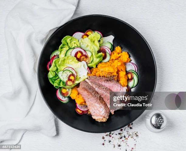 steak with sweet potatoes and salad - salt and pepper shaker overhead stock pictures, royalty-free photos & images