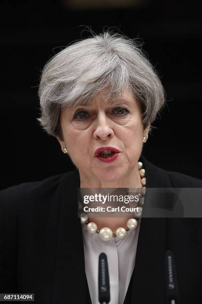 Britain's Prime Minister Theresa May speaks to the media after chairing a meeting of the Governments emergency COBRA committee at Downing Street on...