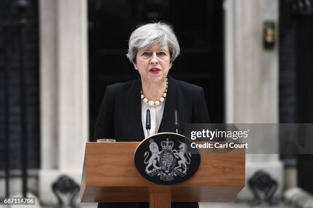 Britain's Prime Minister Theresa May speaks to the media after chairing a meeting of the Governments emergency COBRA committee at Downing Street on...