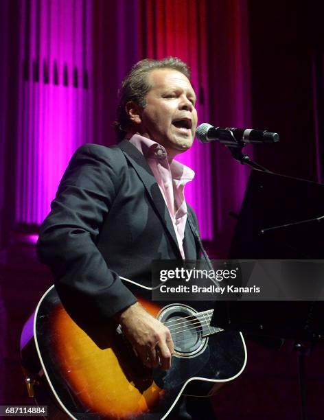 Country musician Troy Cassar-Daley performs during the Queensland Maroons State of Origin official launch at the Brisbane City Town Hall on May 23,...