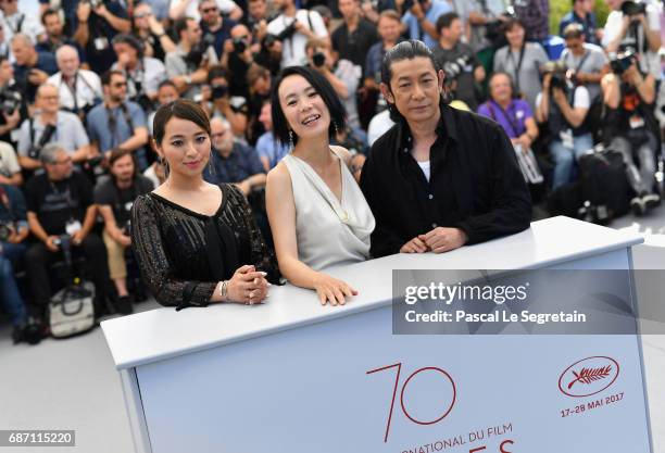 Actors Nagase Masatoshi, Director Naomi Kawase and Ayame Misaki attend the "Hikari " photocall during the 70th annual Cannes Film Festival at Palais...