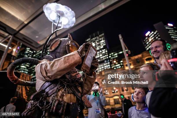 Character dressed for the media preview of the Vivid Festival installation What Lies Beneath at Barangaroo Park, Sydney. The piece is described as a...