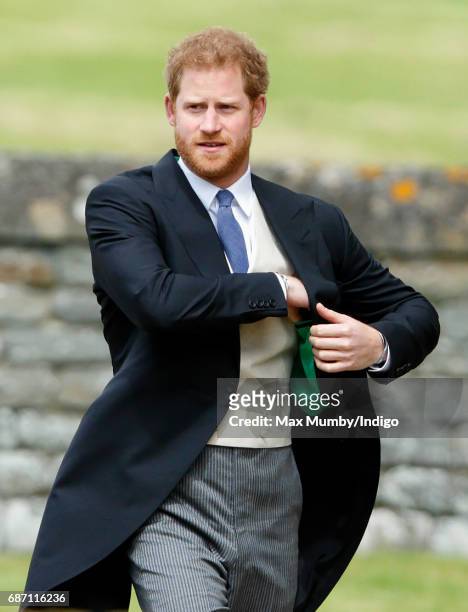 Prince Harry attends the wedding of Pippa Middleton and James Matthews at St Mark's Church on May 20, 2017 in Englefield Green, England.