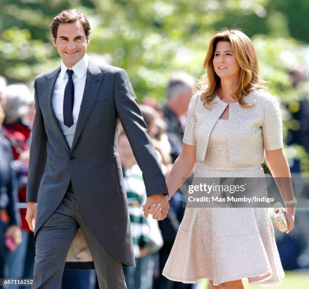 Roger Federer and Mirka Federer attend the wedding of Pippa Middleton and James Matthews at St Mark's Church on May 20, 2017 in Englefield Green,...