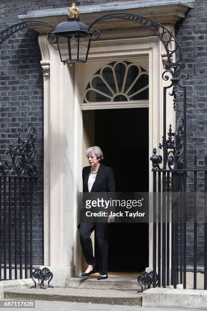 Britain's Prime Minister Theresa May makes her way to speak to the media after chairing a meeting of the Governments emergency COBRA committee at...