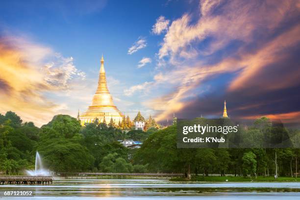 shwedagon pagoda in sunset time - shwedagon pagoda stock pictures, royalty-free photos & images