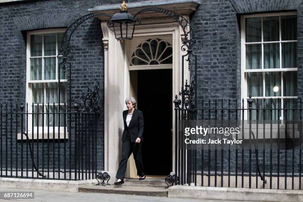 British Prime Minister Theresa May steps out to make a statement in Downing Street after chairing a COBRA meeting on May 23, 2017 in London, England....