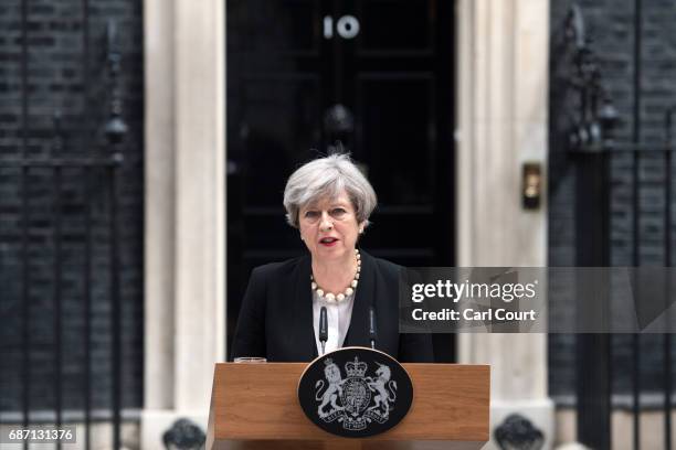 Britain's Prime Minister Theresa May addresses the media as she makes a statement in Downing Street following a COBRA meeting to discuss the...