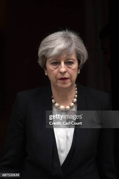 Britain's Prime Minister Theresa May leaves Downing Street after addressing the media following a COBRA meeting to discuss the government's response...