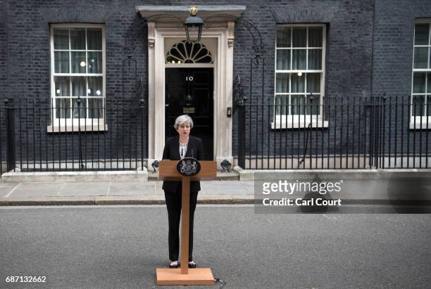 Britain's Prime Minister Theresa May addresses the media as she makes a statement in Downing Street following a COBRA meeting to discuss the...