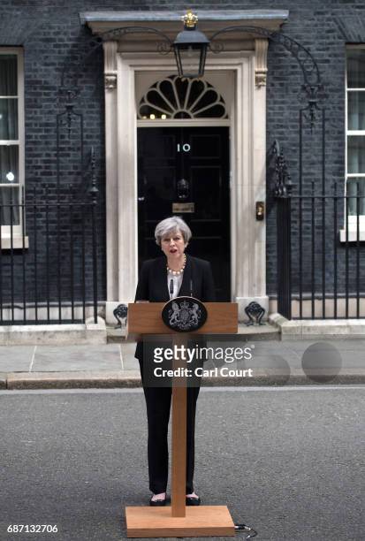 Britain's Prime Minister Theresa May addresses the media as she makes a statement in Downing Street following a COBRA meeting to discuss the...