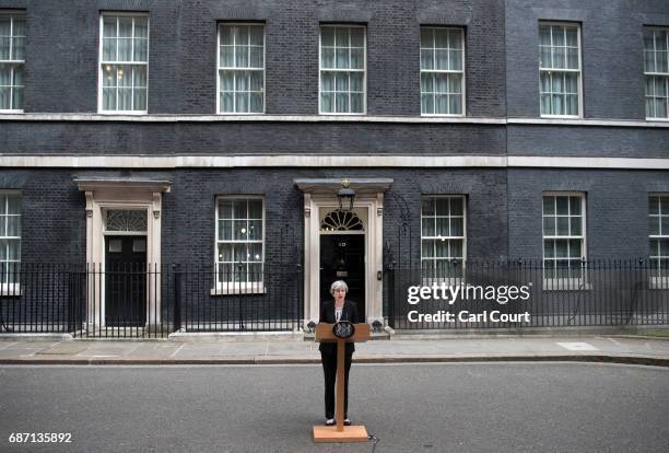 Britain's Prime Minister Theresa May addresses the media as she makes a statement in Downing Street following a COBRA meeting to discuss the...