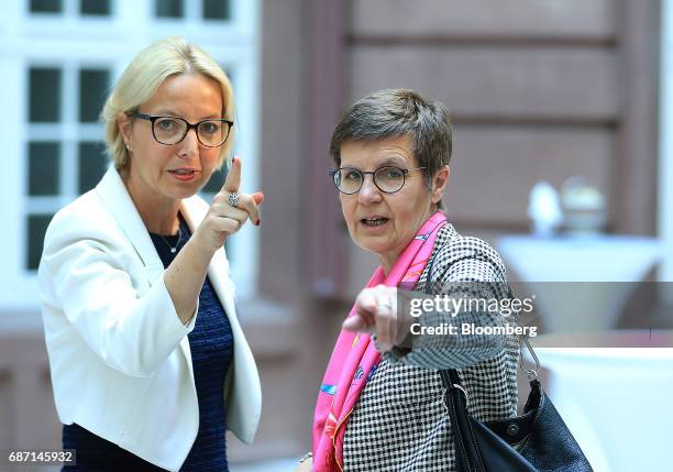 Christine Graeff, director general for communications at the European Central Bank , left, and Elke Koenig, head of the European Union's Single...