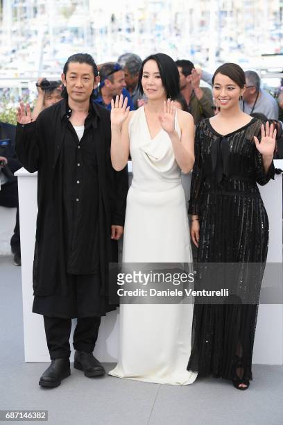 Nagase Masatoshi, Director Naomi Kawase and Ayame Misaki attend the "Hikari " photocall during the 70th annual Cannes Film Festival at Palais des...