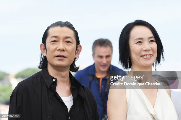 Nagase Masatoshi and Director Naomi Kawase attend the "Hikari " photocall during the 70th annual Cannes Film Festival at Palais des Festivals on May...