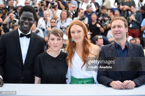 Souleymane Seye, director, Leonor Serraille, Laetitia Dosch pand Gregoire Monsaingeon pose during a photocall for the film Jeune Femme un certain...