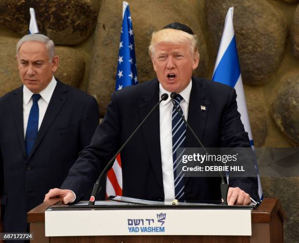President Donald Trump gives remarks at the Yad Vashem Holocaust Museum in Jerusalem on May 23, 2017 as Israeli Prime Minister Benjamin Netanyahu...