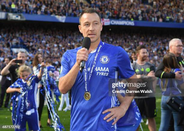 John Terry of Chelsea celebrates winning the league following the Premier League match between Chelsea and Sunderland at Stamford Bridge on May 21,...