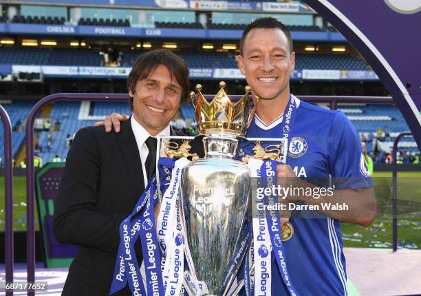 Antonio Conte, Manager of Chelsea anch John Terry of Chelsea celebrate winning the league following the Premier League match between Chelsea and...