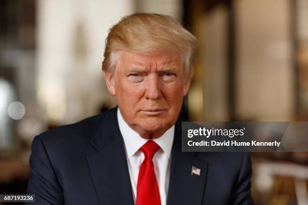 Portrait of American real estate developer and President-elect Donald Trump as he poses in his office at Trump Tower, New York, New York, November...