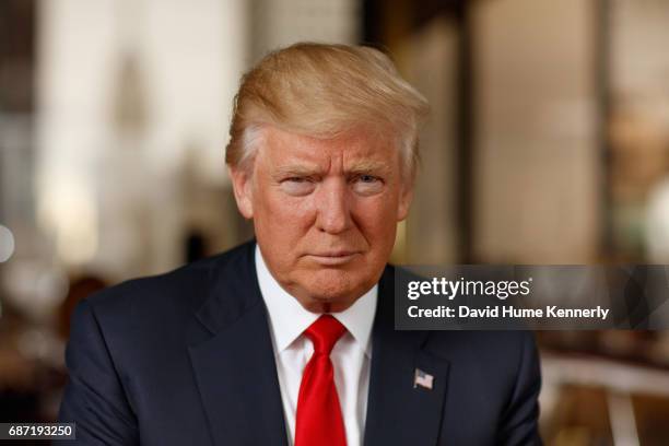 Portrait of American real estate developer and President-elect Donald Trump as he poses in his office at Trump Tower, New York, New York, November...