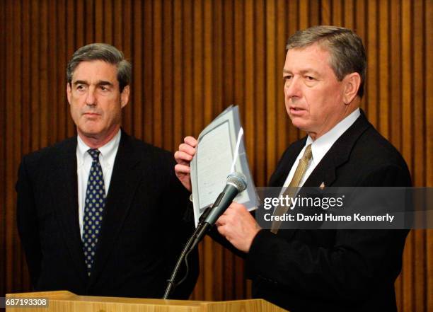 View of FBI Director Robert Mueller and US Attorney General John Ashcroft during a press conference at FBI headquarters, Washington DC, September 28,...