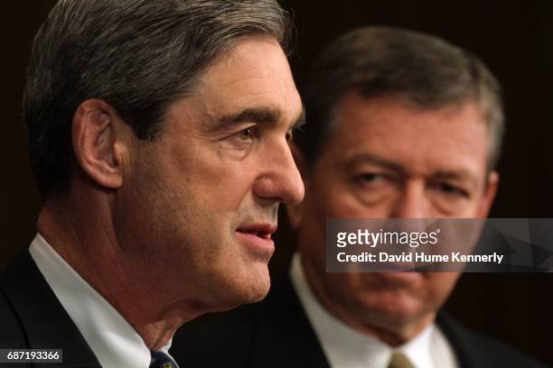 View of FBI Director Robert Mueller and US Attorney General John Ashcroft during a press conference at FBI headquarters, Washington DC, September 28,...