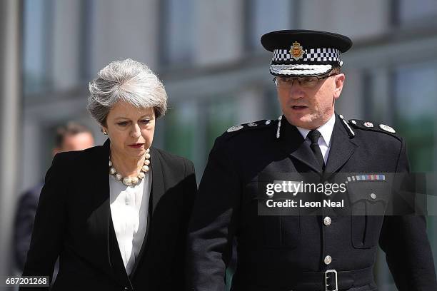 Britain's Prime Minister Theresa May meets Chief Constable of Greater Manchester Police Ian Hopkins on May 23, 2017 in Manchester, England. Prime...