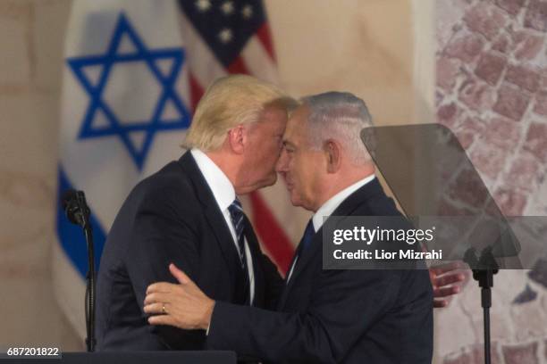 President Donald Trump and Israel's Prime Minister Benjamin Netanyahu shake hands after delivering a speech during a visit to the Israel Museum on...