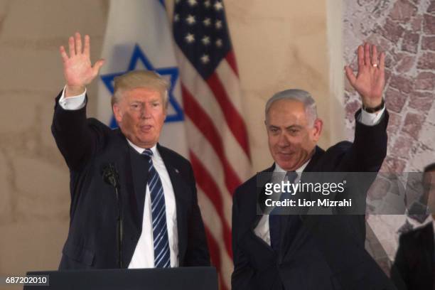 President Donald Trump and Israel's Prime Minister Benjamin Netanyahu wave after delivering a speech during a visit to the Israel Museum on May 23,...