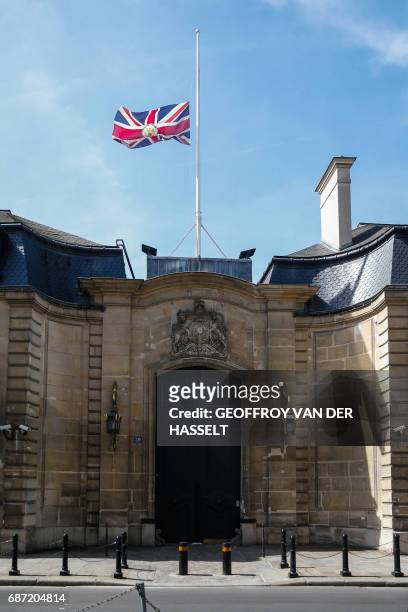 The Union Jack flies at half-mast above the British Embassy in Paris on May 23 as a mark of respect to those killed and injured in the terror attack...