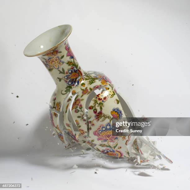 breaking flowervase - broken stock-fotos und bilder