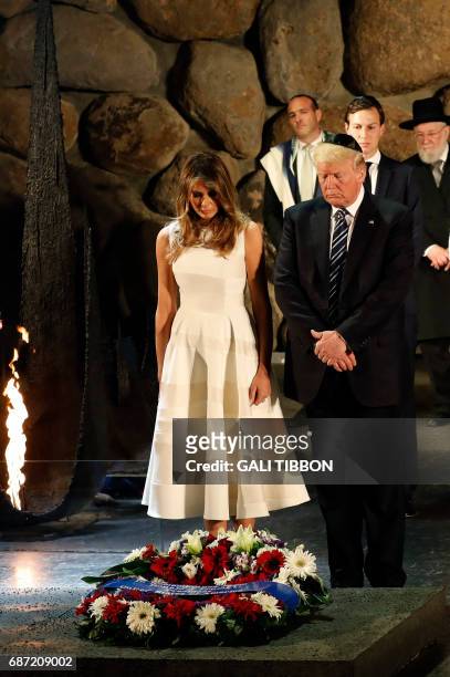 White House senior advisor Jared Kushner , First Lady Melania Trump , US President Donald Trump , and Rabbi Yisrael Meir Lau , attend a wreath laying...