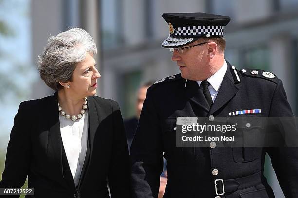 Britain's Prime Minister Theresa May meets Chief Constable of Greater Manchester Police Ian Hopkins on May 23, 2017 in Manchester, England. Prime...