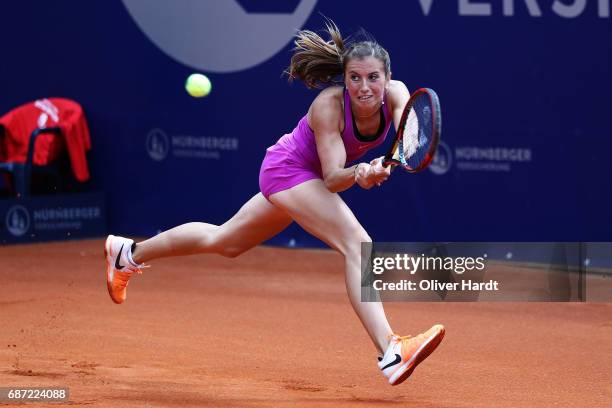 Annika Beck of Germany in action against Lena Rueffer of Germany in the first round during the WTA Nuernberger Versicherungscup on May 23, 2017 in...