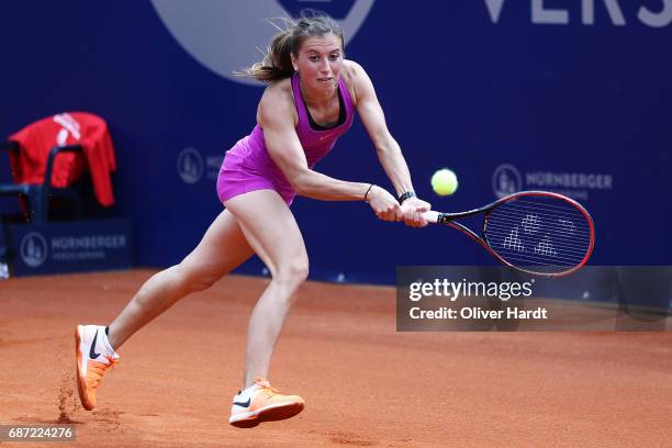 Annika Beck of Germany in action against Lena Rueffer of Germany in the first round during the WTA Nuernberger Versicherungscup on May 23, 2017 in...