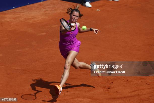 Annika Beck of Germany in action against Lena Rueffer of Germany in the first round during the WTA Nuernberger Versicherungscup on May 23, 2017 in...